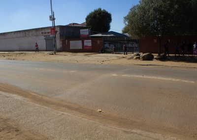 Maintenance of road markings at the raised pedestrian crossings and speed humps close to the school